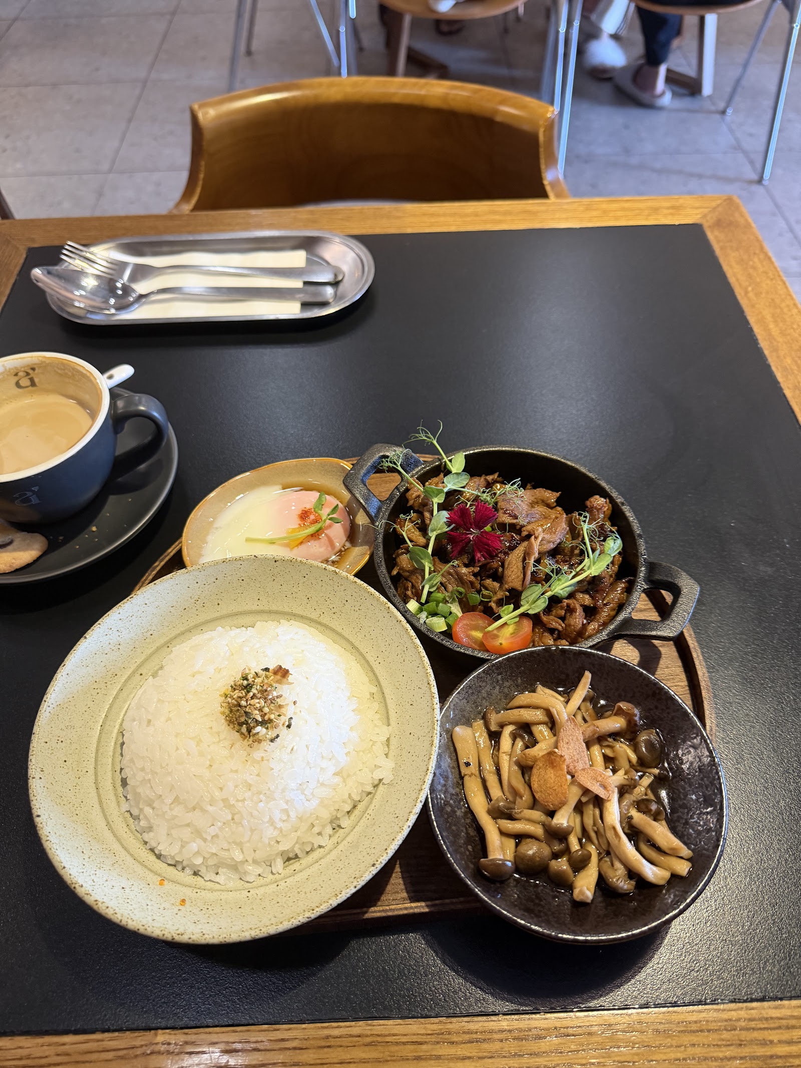 Rice and grill spread with coffee at arest Cafe