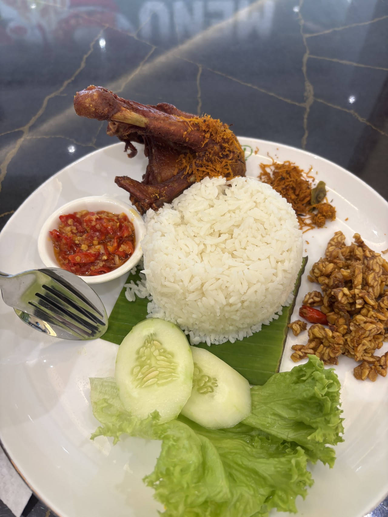 Ayam gepuk set with rice, sambal and ulam at Ayam Gepuk Top Global Permaisuri Cheras