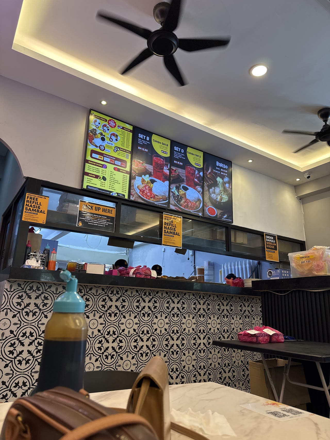 Counter and digital menu board inside Ayam Gepuk Top Global Permaisuri Cheras