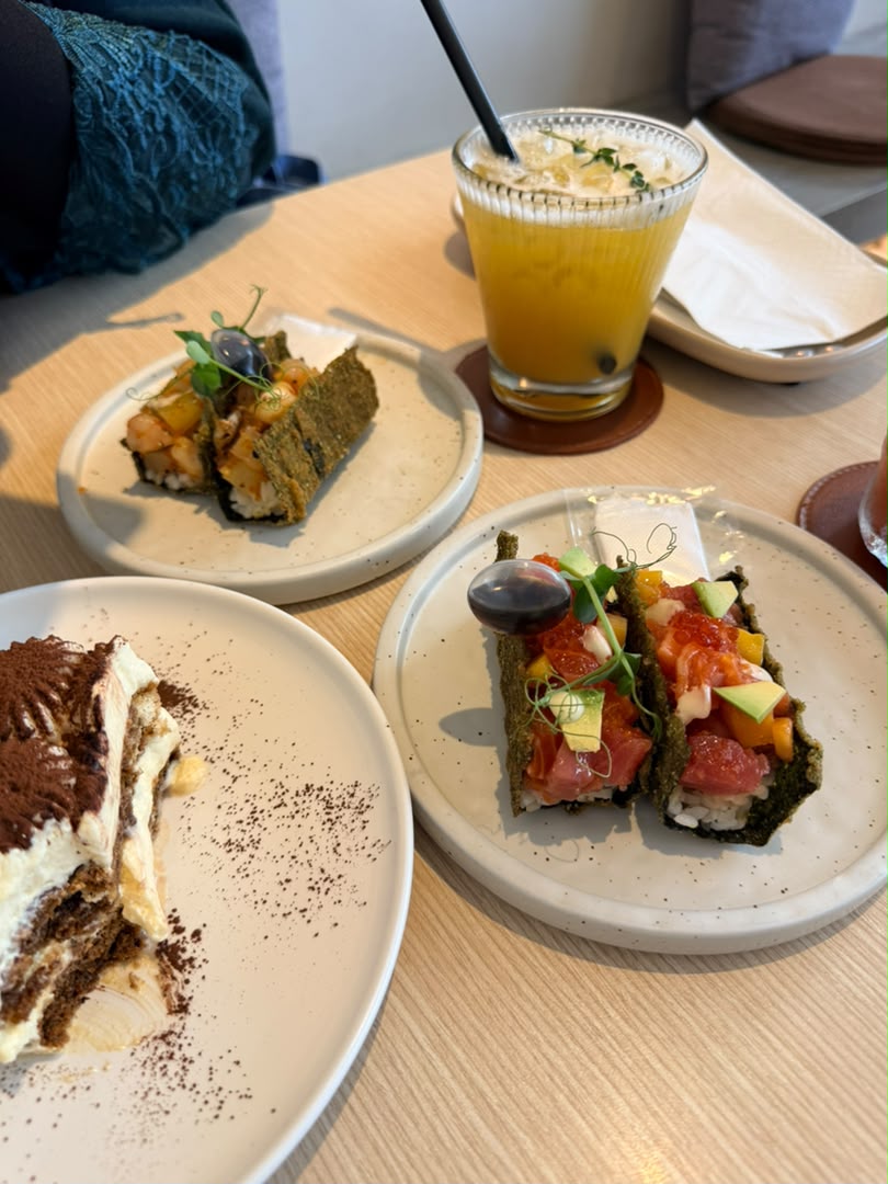 Tuna and seafood tacos with signature drink at CC by MEL