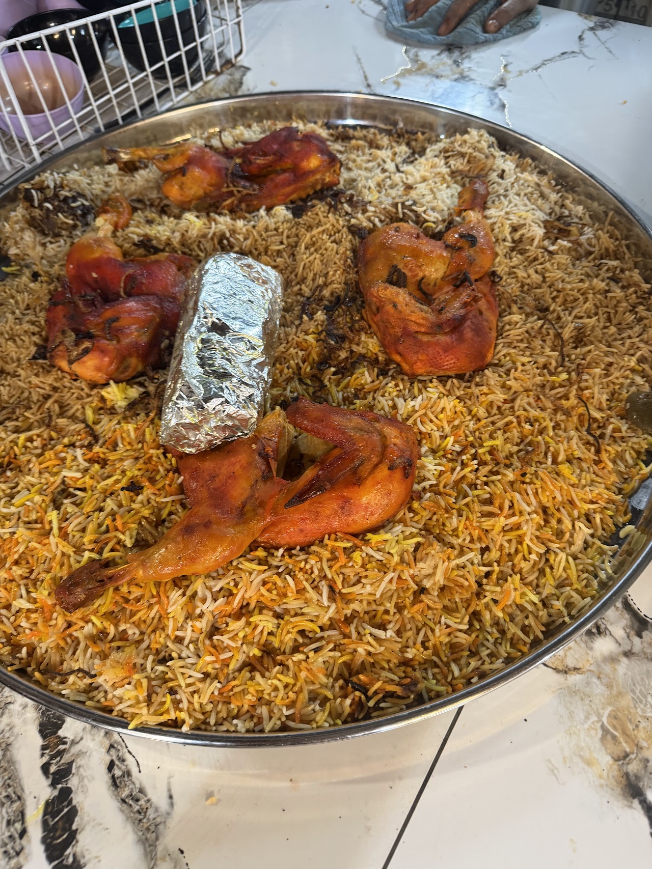Chicken mandi rice tray at Gate of Yemen Restaurant