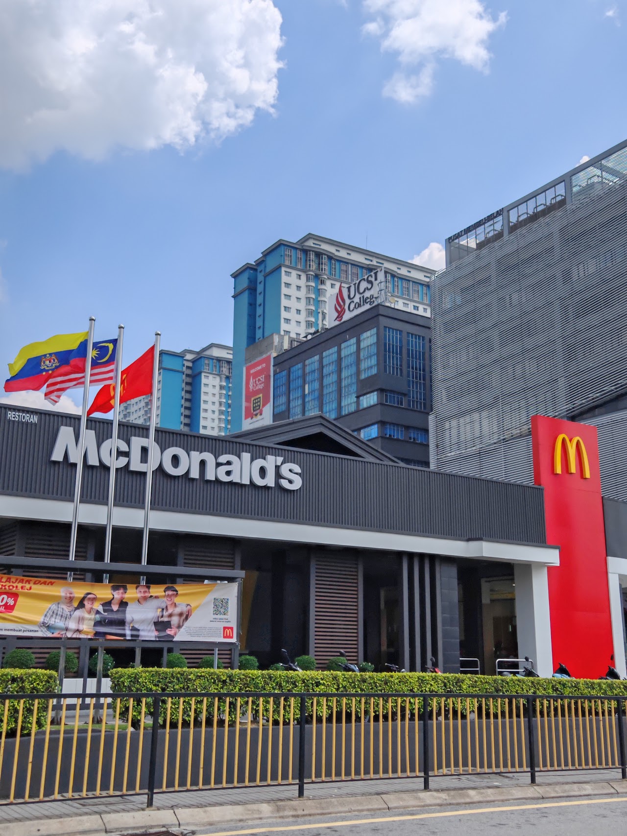 McDonald's Taman Connaught DT storefront with red M signage tower