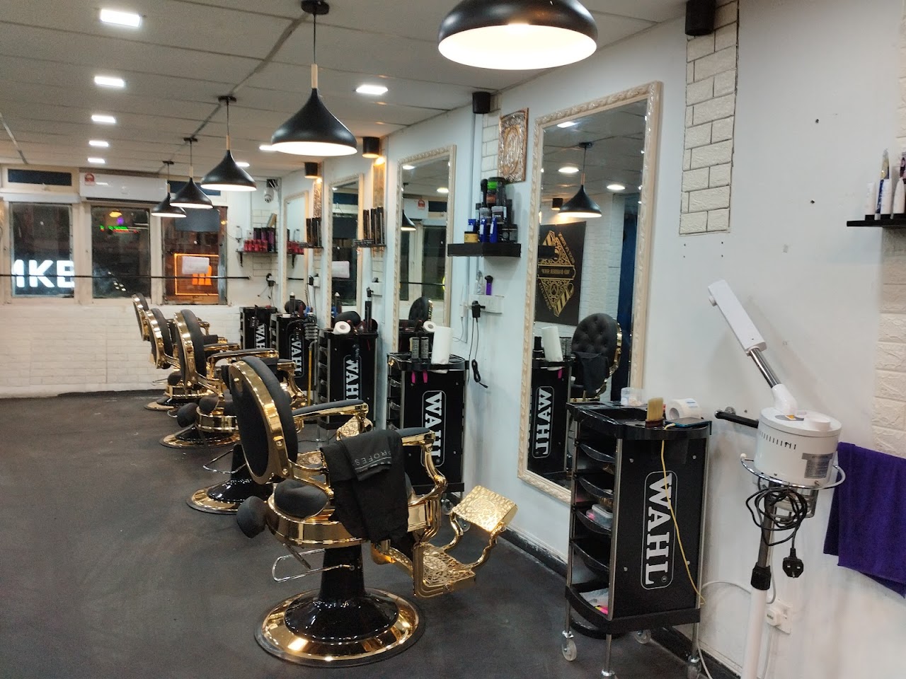Gold barber chairs at MD Barber Shop, SS15