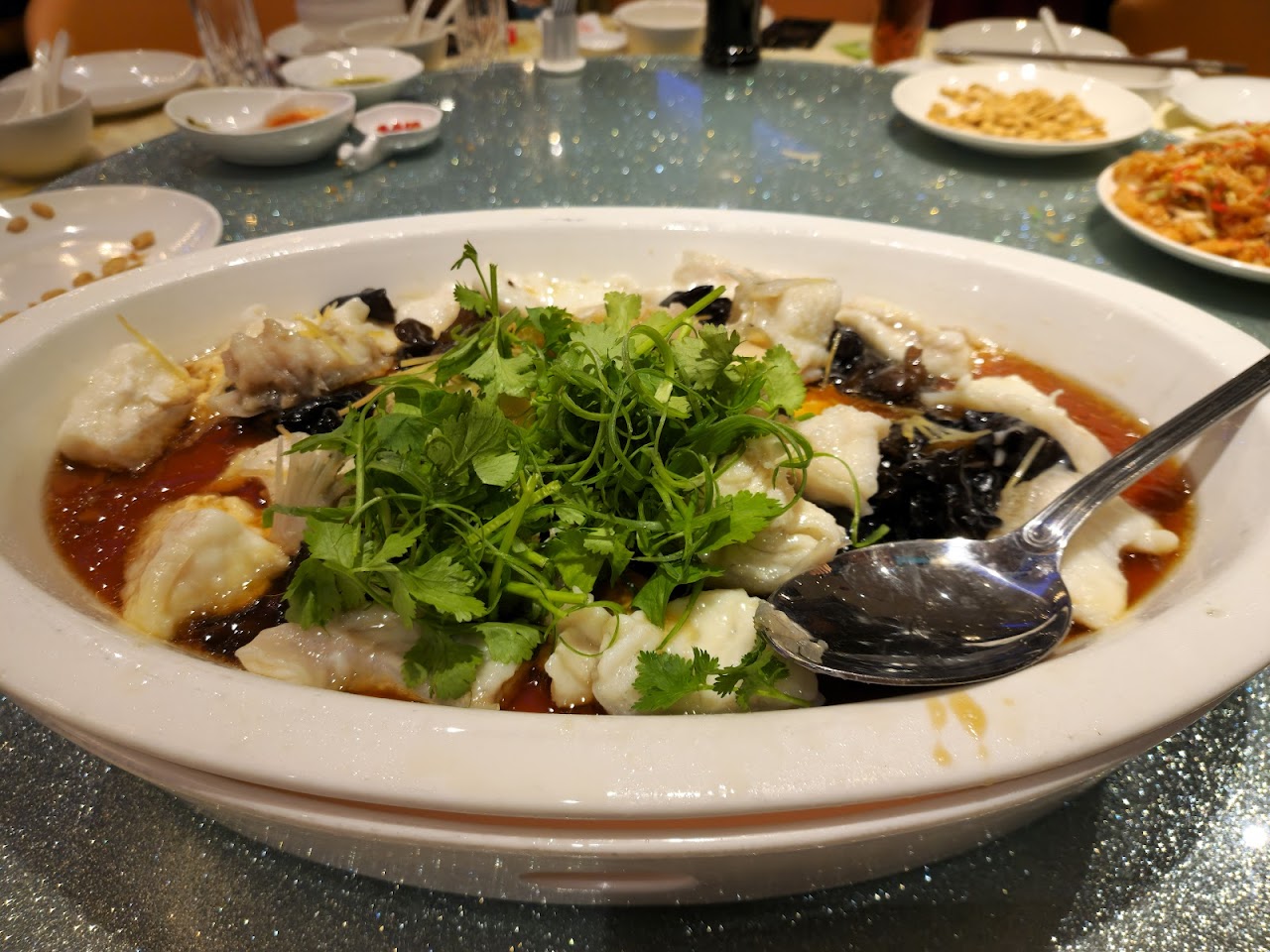 Steamed fish with black fungus and coriander at OUG Jade