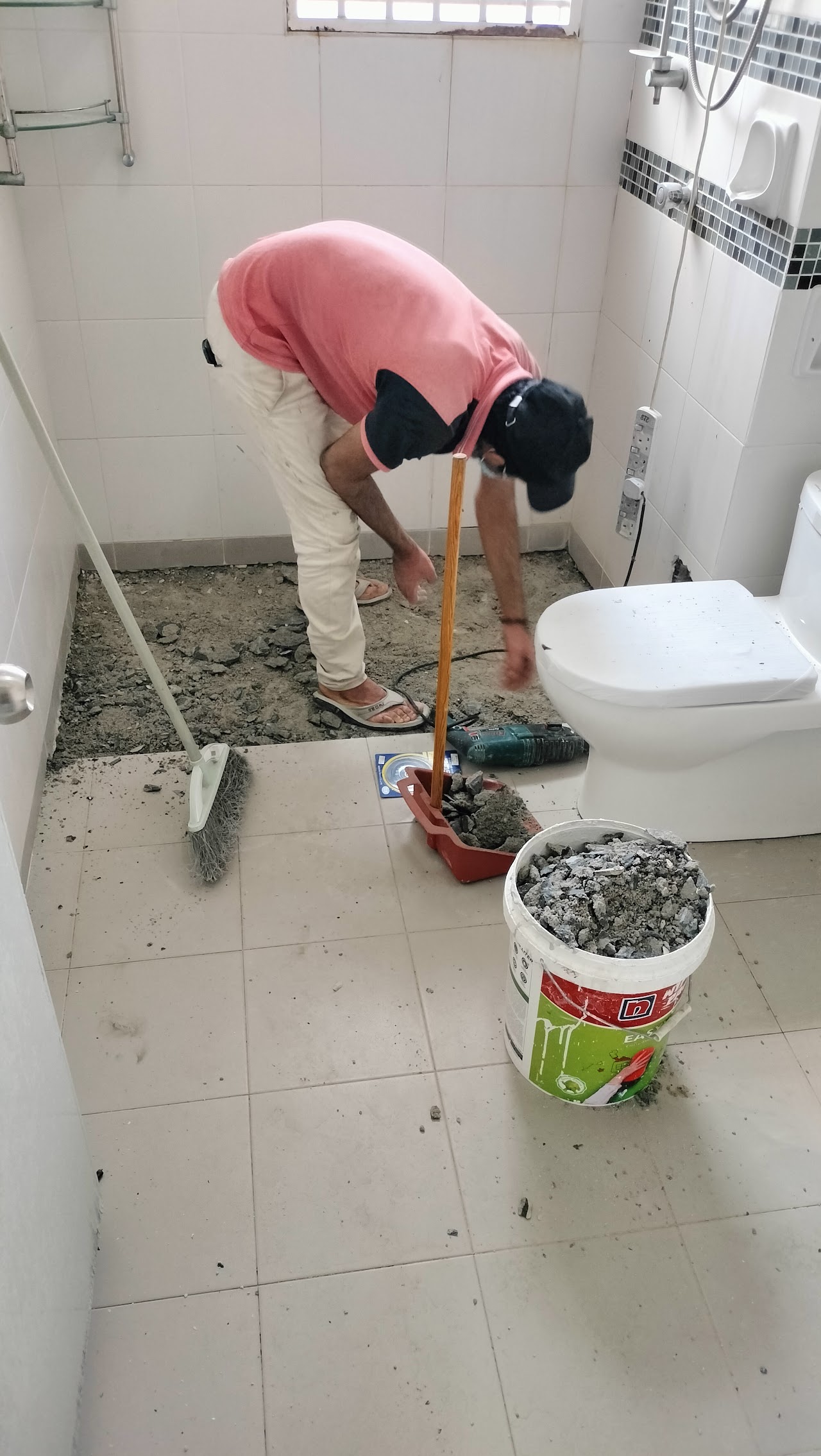 Bathroom retiling job by Qucik Renovation Enterprise