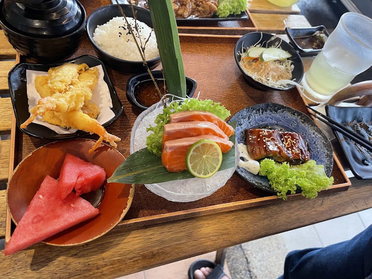 Set meal close-up with salmon sashimi and teriyaki at Shin Zushi