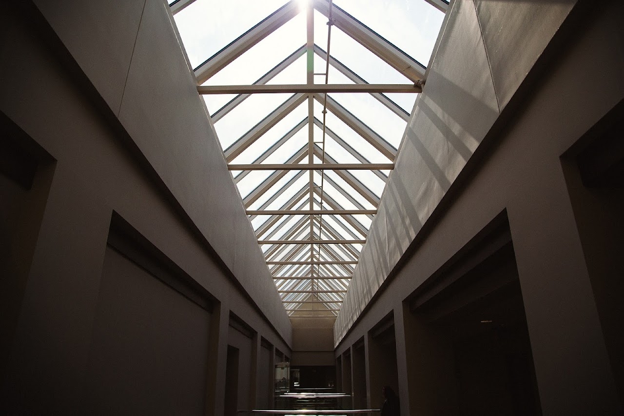 Skylight TECH Roofing & Awning — structural glass skylight corridor, real job site